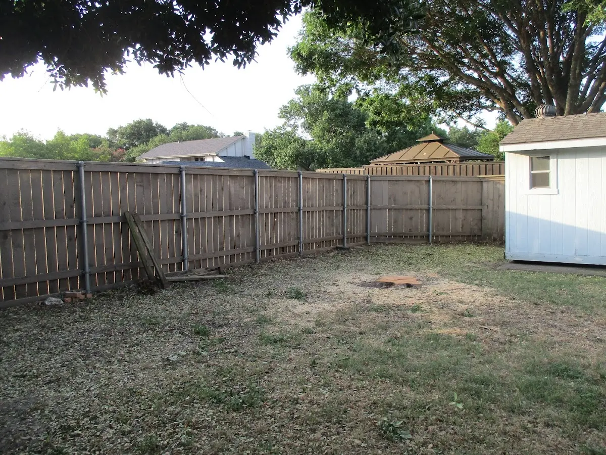 Cleared yard after professional tree removal in Kuna